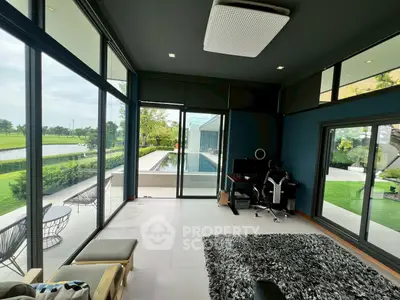 Luxurious modern living room with pool view and stylish decor