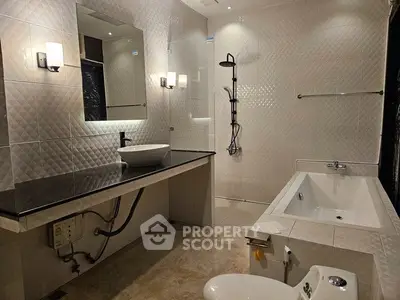 Luxurious modern bathroom with elegant fixtures and spacious bathtub