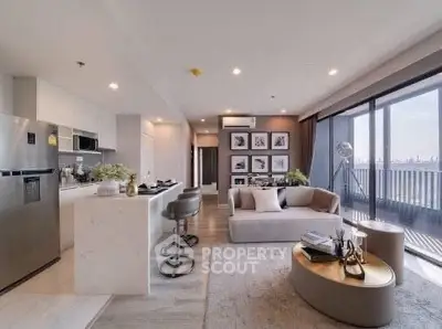 Luxurious open-plan living room with modern kitchen and stunning balcony view.