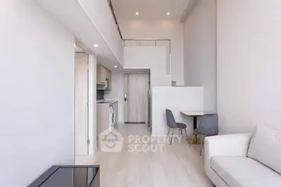 Modern loft apartment with high ceilings, open layout, and stylish furnishings.
