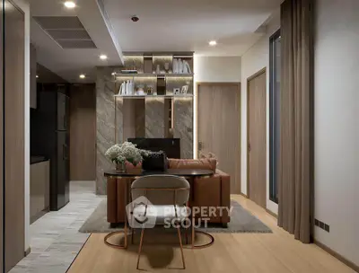 Modern living room with stylish decor and open kitchen layout in a cozy apartment.