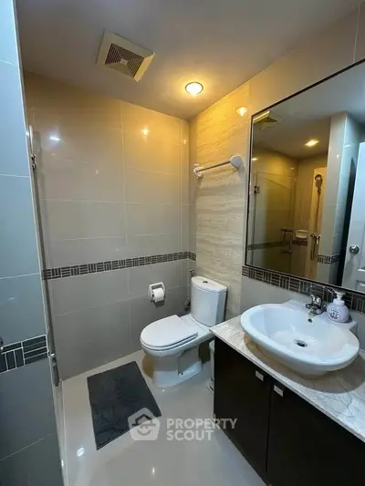 Modern bathroom with sleek fixtures and elegant tile design