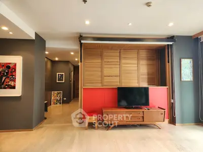 Stylish living room with modern decor and wooden accents