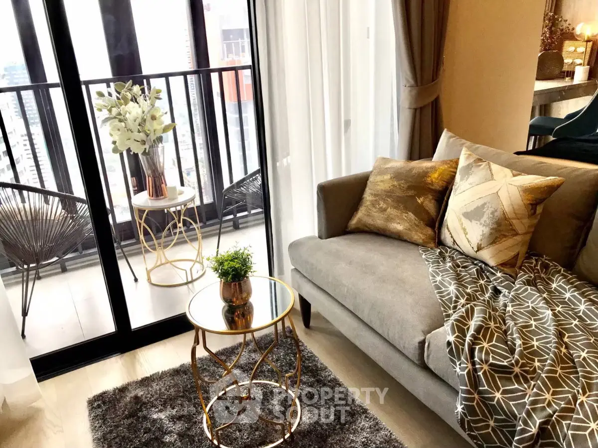 Stylish living room with elegant decor and balcony view in modern apartment