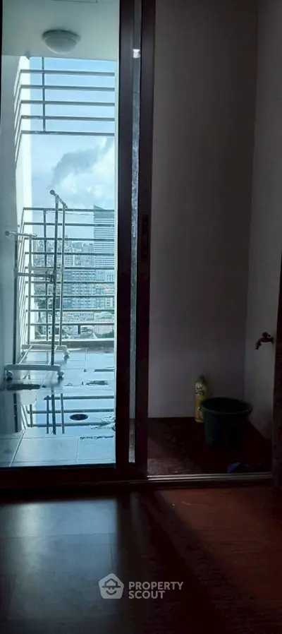 Modern balcony with city view and sleek railing design