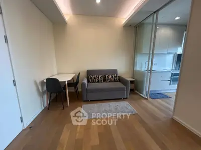 Modern apartment interior with cozy living area and sleek kitchen design
