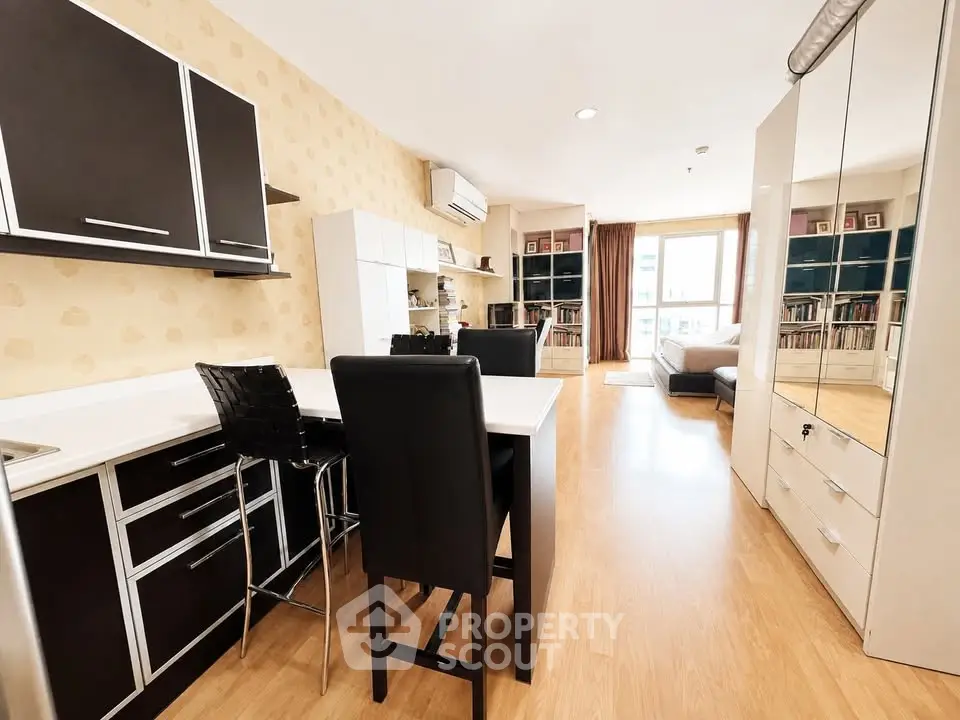 Spacious modern living room with open kitchen and stylish decor
