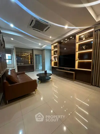Luxurious modern living room with sleek design and elegant lighting