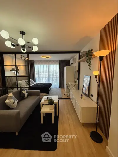 Modern living room with stylish decor, open layout, and natural light, perfect for urban living.