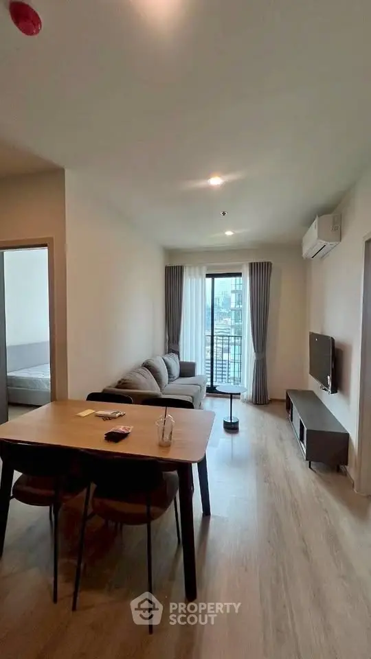 Modern living room with balcony view in stylish apartment