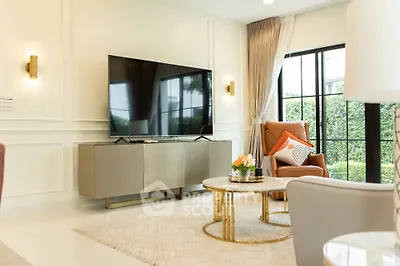 Elegant living room with modern TV and stylish decor