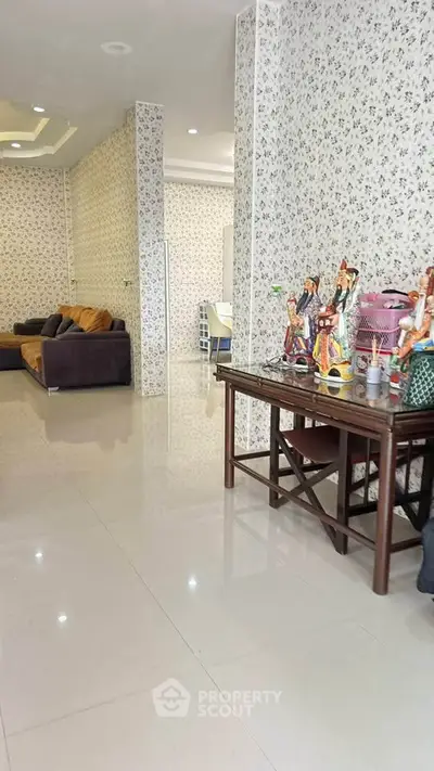 Spacious living room with elegant decor and comfortable seating