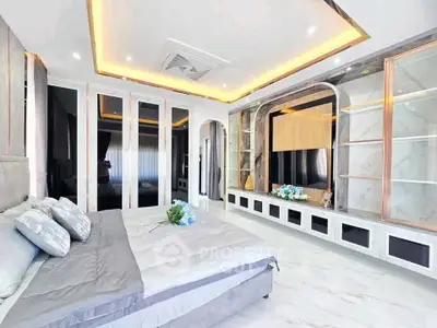 Luxurious modern bedroom with elegant decor and spacious design