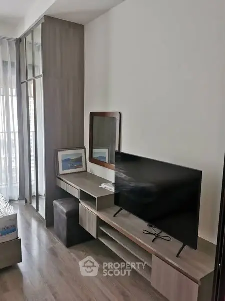 Modern living room with sleek TV setup and stylish decor