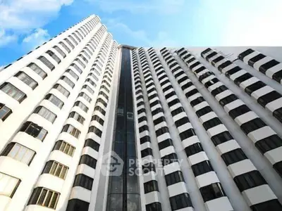 Stunning high-rise building with modern architecture and panoramic city views.