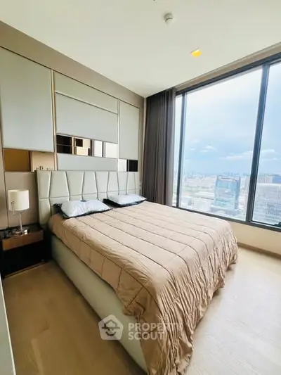 Luxurious bedroom with stunning city view and modern decor