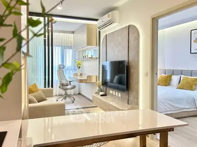 Modern apartment interior with open living room, study area, and cozy bedroom.