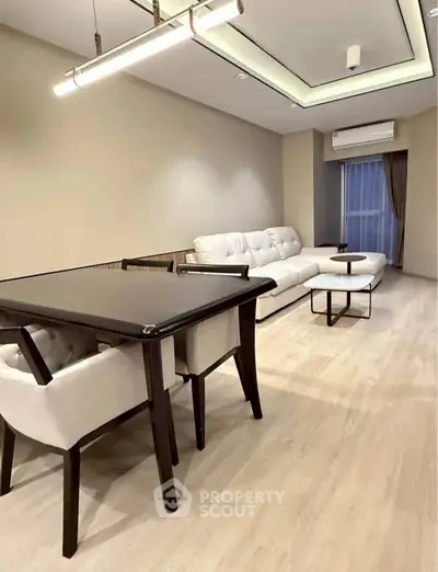 Modern living room with elegant furniture and ambient lighting