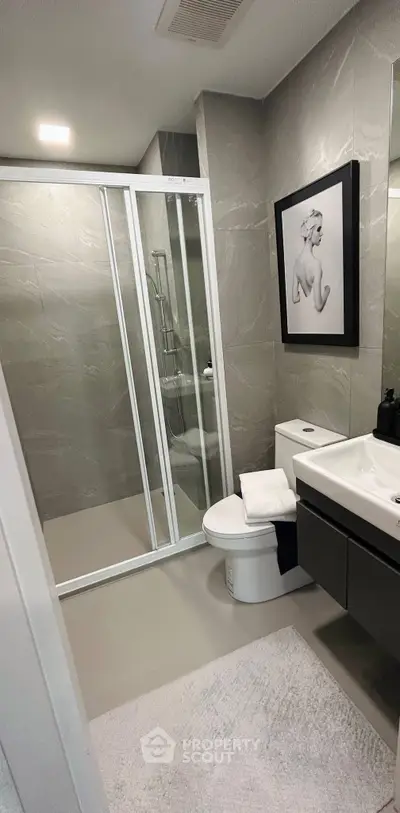 Modern bathroom with sleek shower and elegant decor