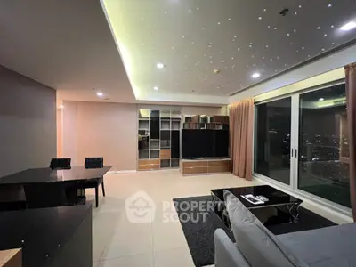 Spacious modern living room with city view and elegant lighting