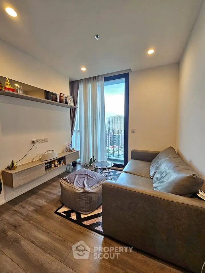 Cozy modern living room with city view and stylish decor