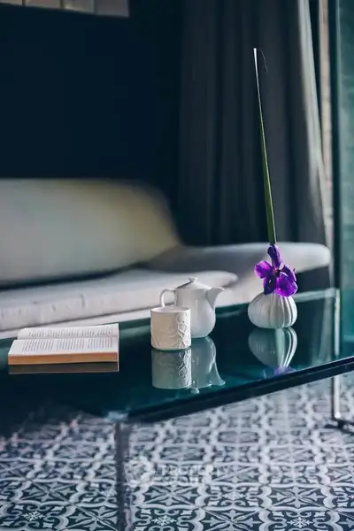 Stylish living room with elegant glass table and modern decor