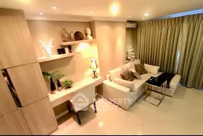 Elegant living room with modern decor and cozy seating area