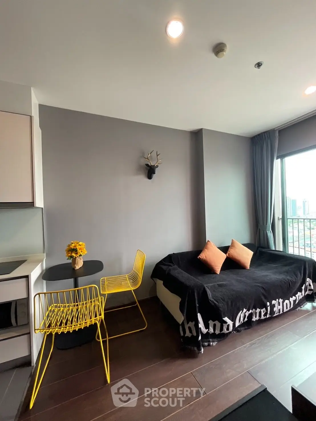 Modern living room with stylish decor and city view