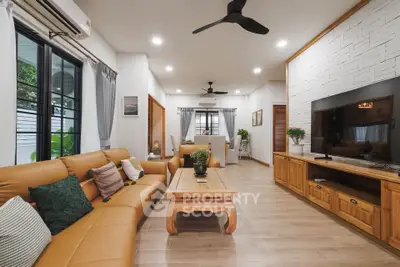 Spacious living room with modern decor and natural light