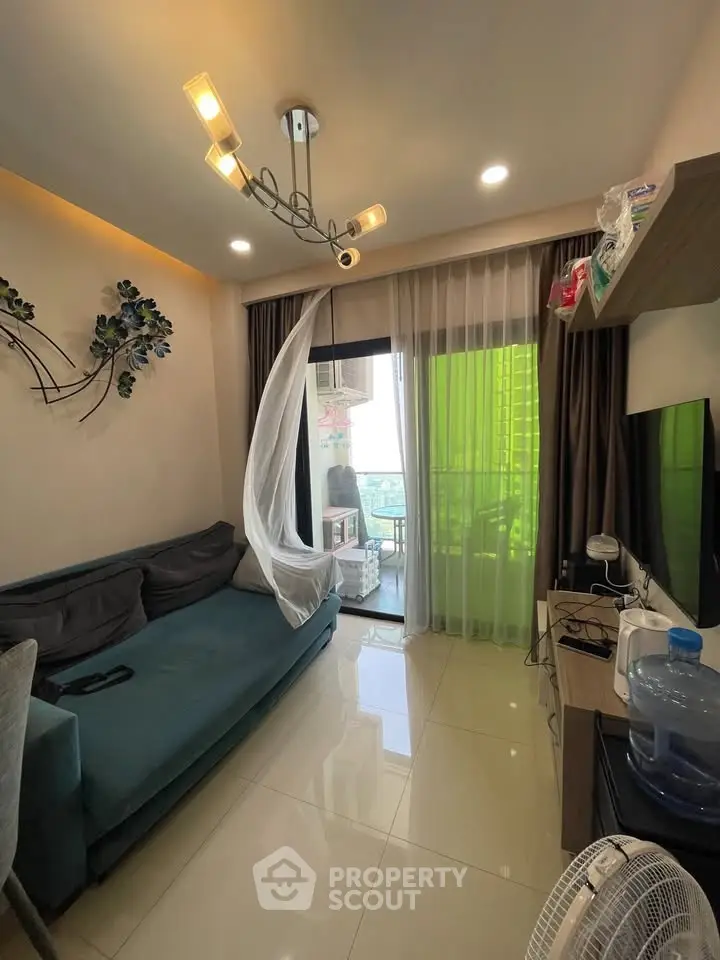 Modern living room with balcony access and stylish decor