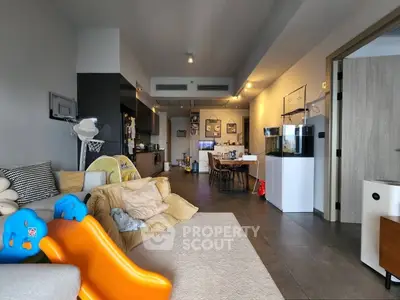 Spacious modern living room with open layout and stylish decor, perfect for family gatherings.