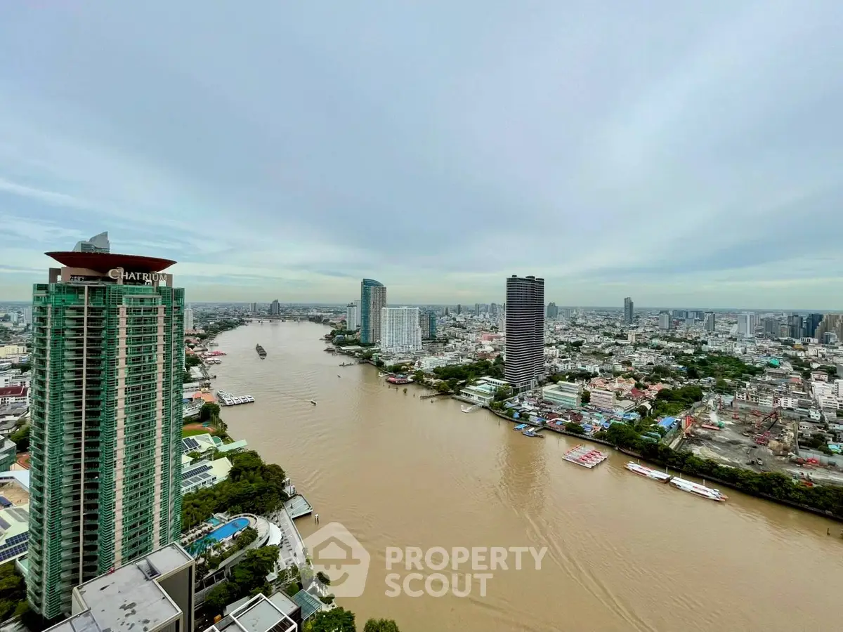 Stunning cityscape view with river and high-rise buildings, perfect for urban living.