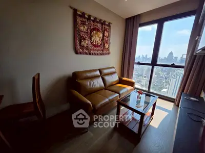 Stylish living room with leather sofa and city view from large window