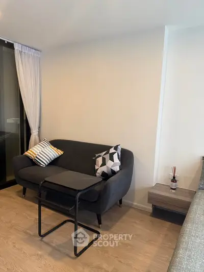 Modern living room with stylish sofa and minimalist decor