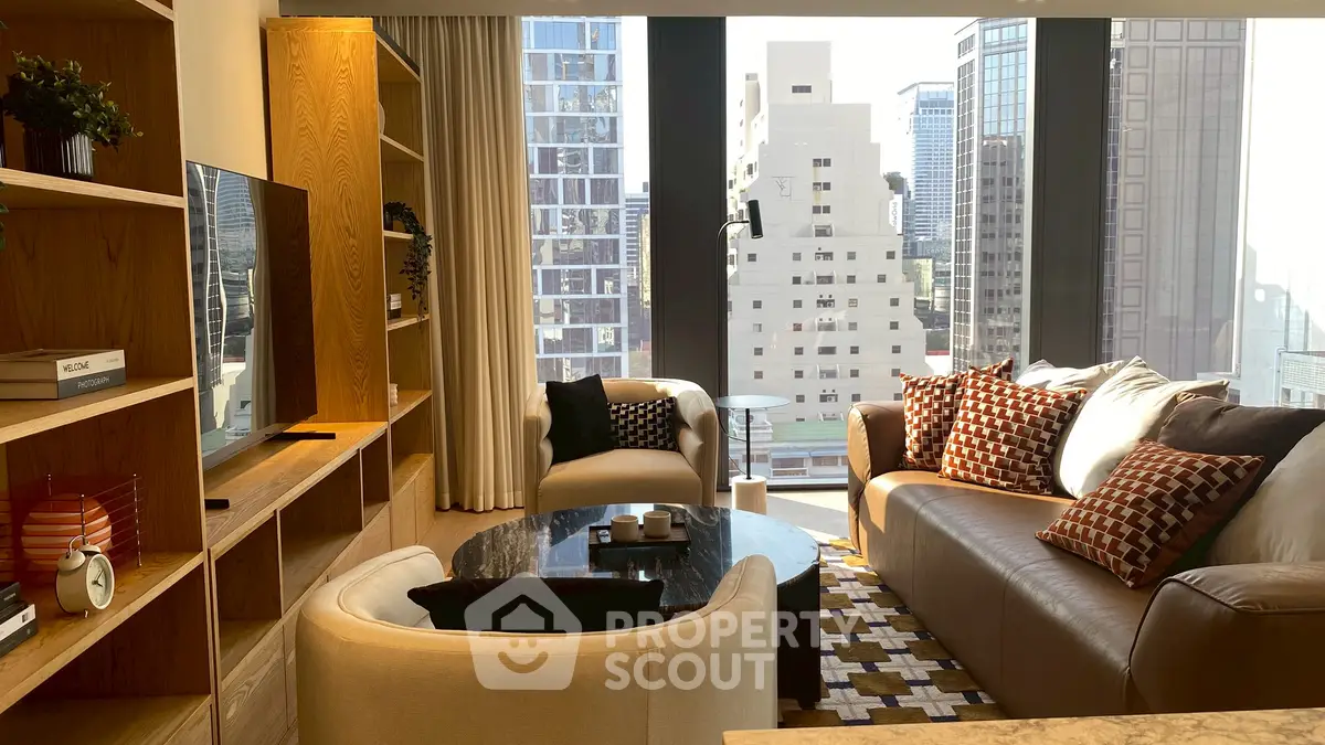 Luxurious living room with stunning city view, modern furniture, and elegant decor in high-rise apartment.