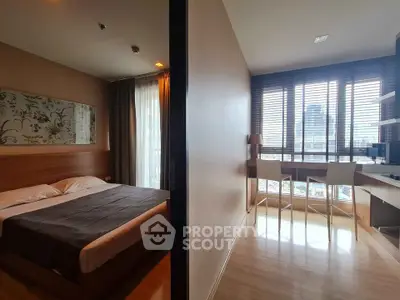 Modern bedroom with city view and stylish workspace