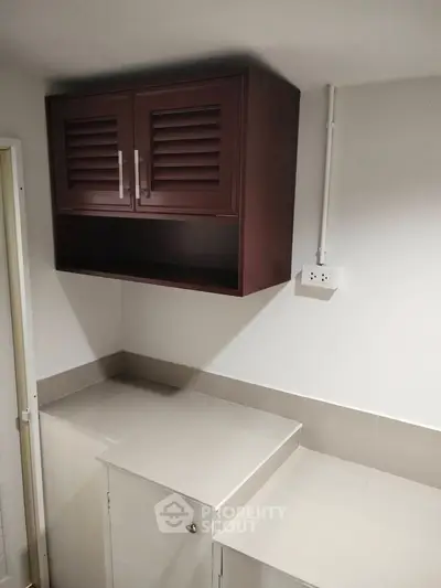 Modern kitchen with sleek cabinetry and minimalist design