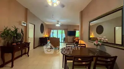 Spacious living room with elegant dining area and stylish decor