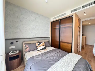 Modern bedroom with stylish decor and wooden accents