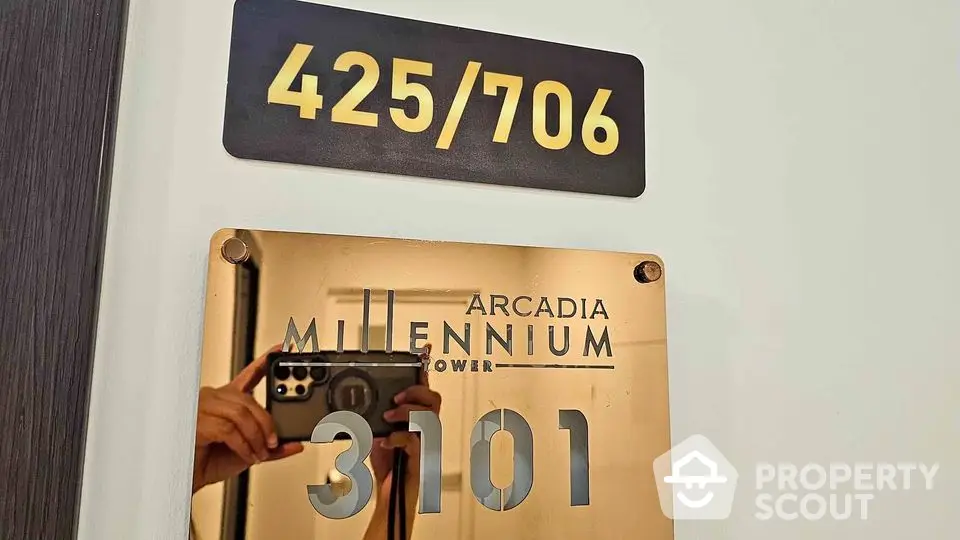 Arcadia Millennium Tower unit number 3101 with reflective signage.