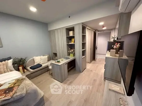 Modern living room with stylish decor and cozy seating area, perfect for relaxation and entertainment.