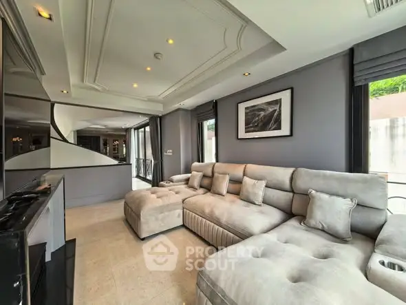 Luxurious modern living room with plush sectional sofa and elegant decor