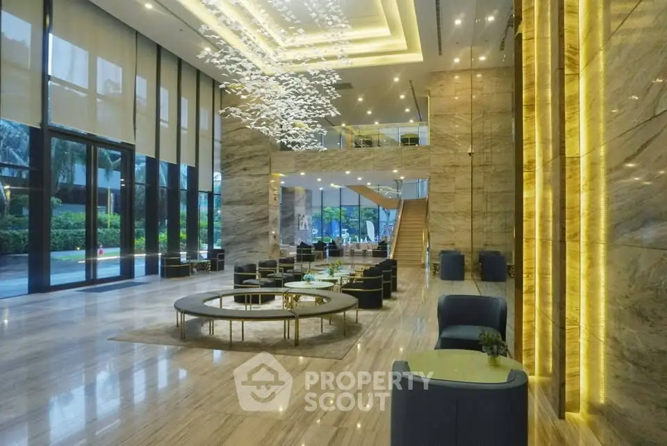 Luxurious modern lobby with elegant seating and stunning lighting fixtures