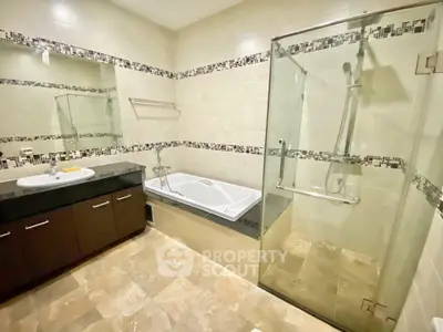 Luxurious bathroom with elegant tile design and modern fixtures