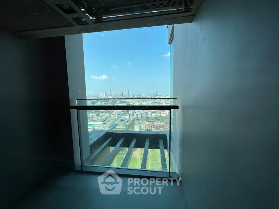 Stunning cityscape view from a modern high-rise balcony, perfect for urban living enthusiasts.