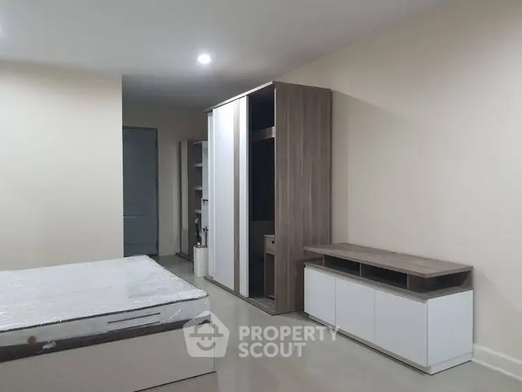 Modern bedroom with sleek furniture and minimalist design