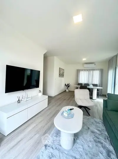 Modern living room with sleek furniture and natural light