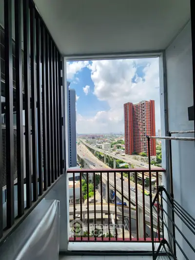 Stunning balcony view with cityscape and modern architecture, perfect for urban living.