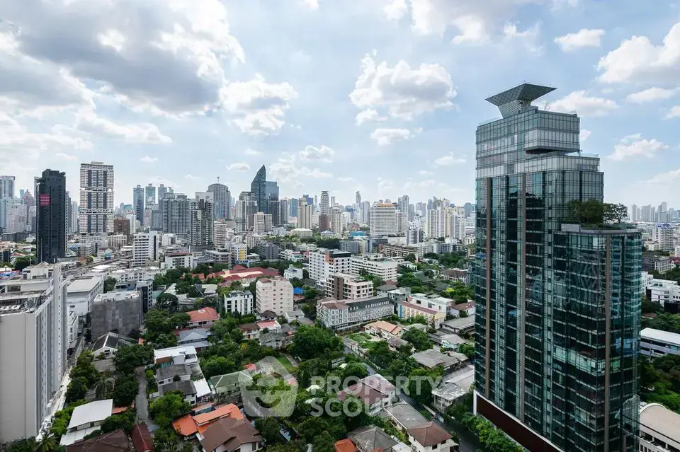 Stunning cityscape view showcasing modern skyscrapers and lush greenery, perfect for urban living enthusiasts.
