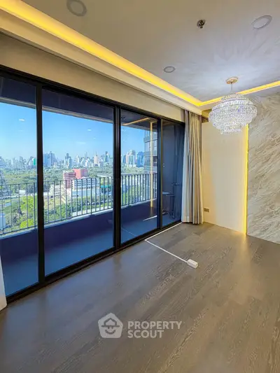 Luxurious living room with stunning city view and elegant chandelier